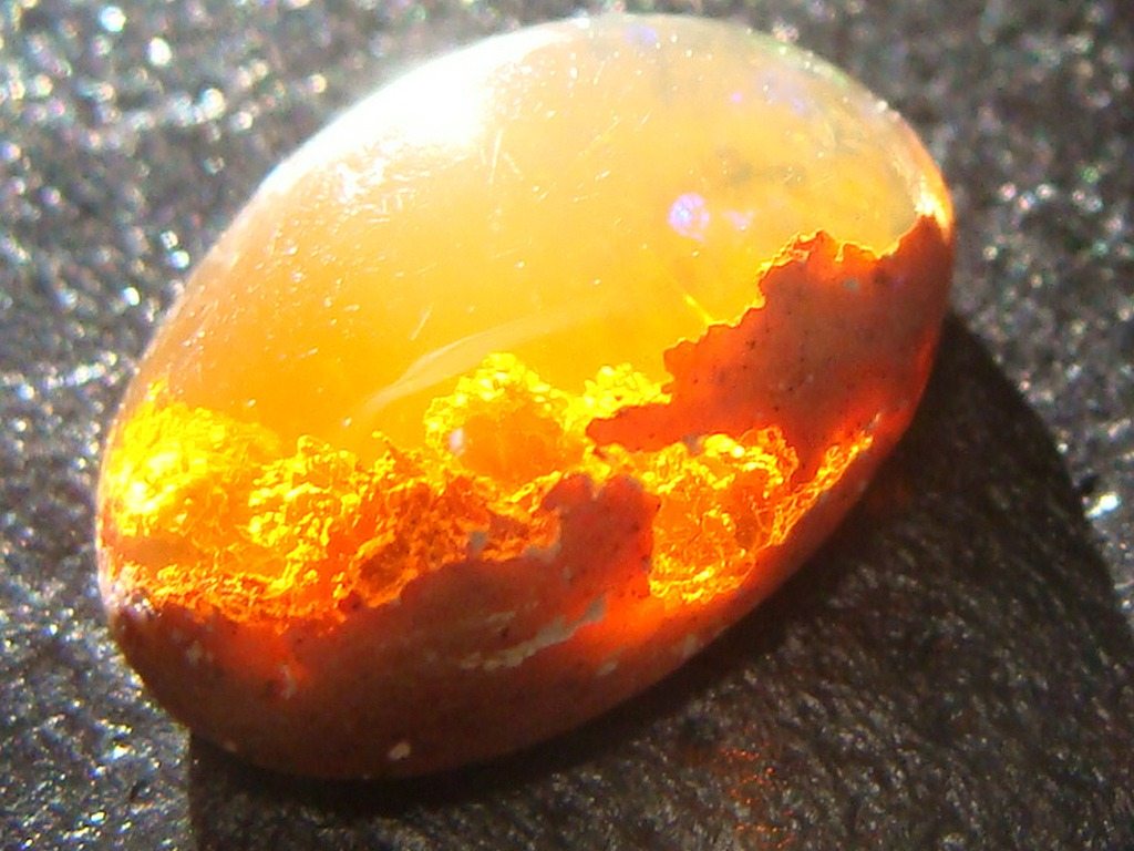 https://www.crystalinnercircle.com/wp-content/uploads/2016/07/fire-opal.jpg